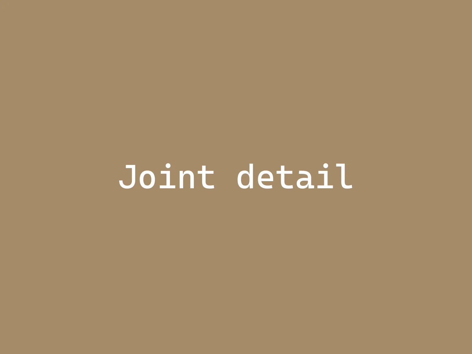 Close-up of a printed corner joint holding two bamboo rods.